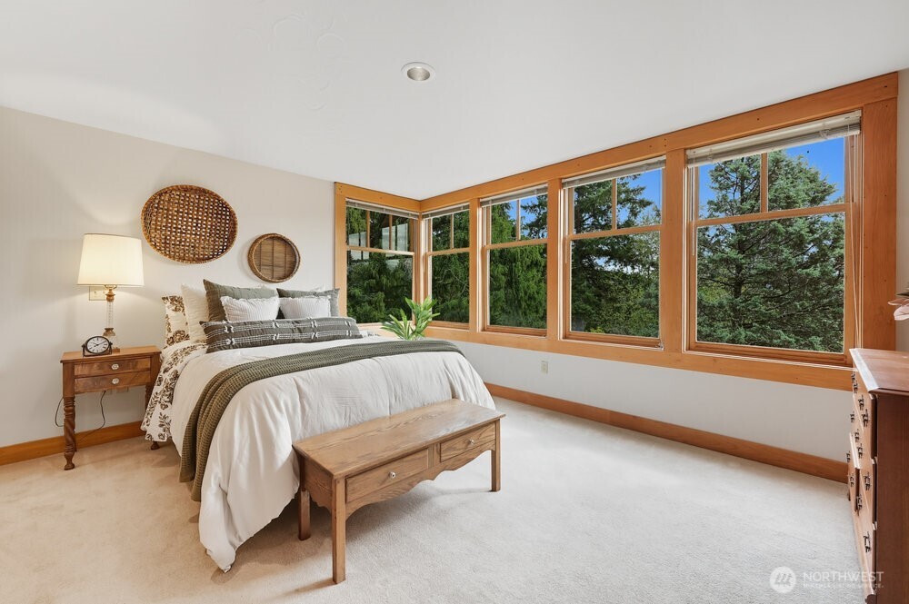 18013 West Snoqualmie Valley Road Northeast Duvall, WA 98019 - Photo 11 of 40 a bedroom with a bed and window
