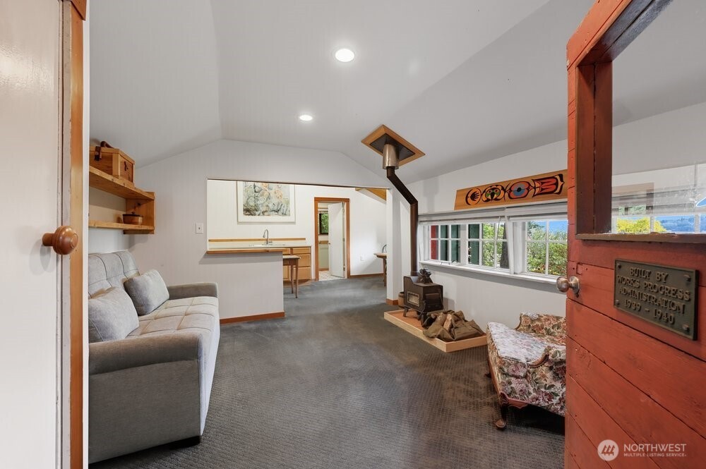 18013 West Snoqualmie Valley Road Northeast Duvall, WA 98019 - Photo 27 of 40 a living room with furniture and a large window