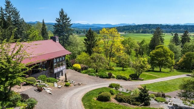 a view of a swimming pool with a yard