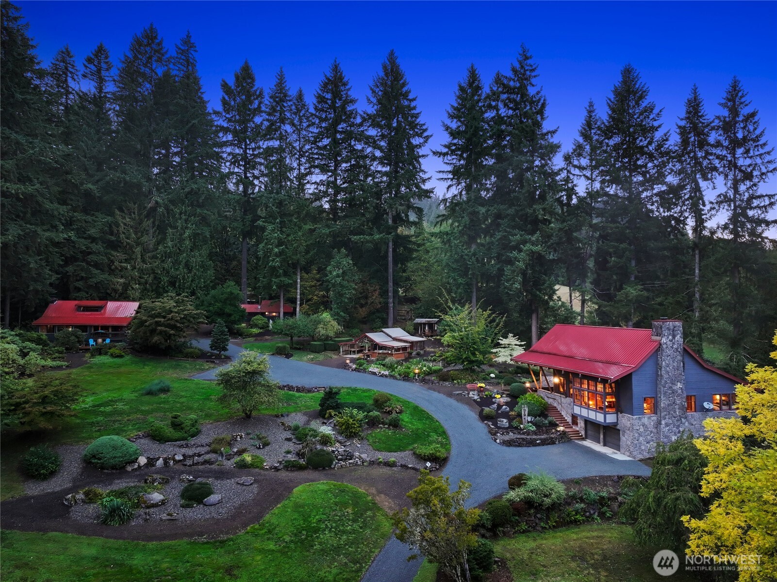 18013 West Snoqualmie Valley Road Northeast Duvall, WA 98019 - Photo 39 of 40 a view of a garden with cars parked