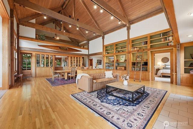 a living room with furniture and a table