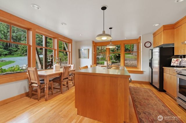 a living room with furniture a window and appliances
