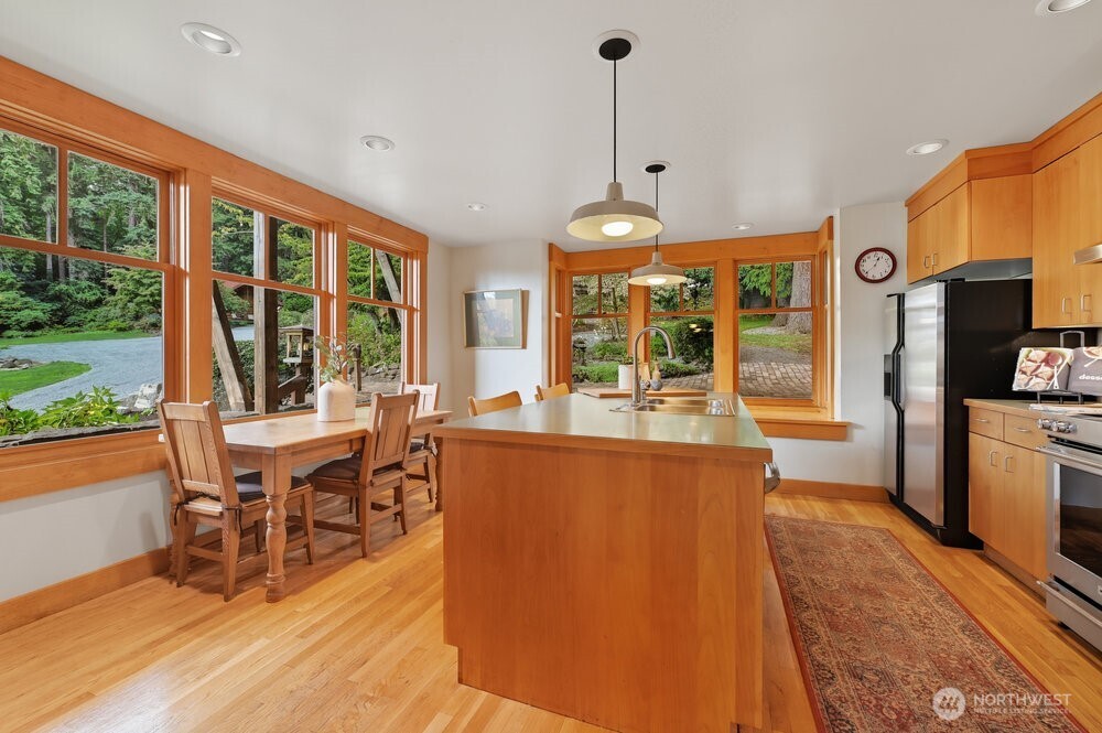 18013 West Snoqualmie Valley Road Northeast Duvall, WA 98019 - Photo 9 of 40 a living room with furniture a window and appliances