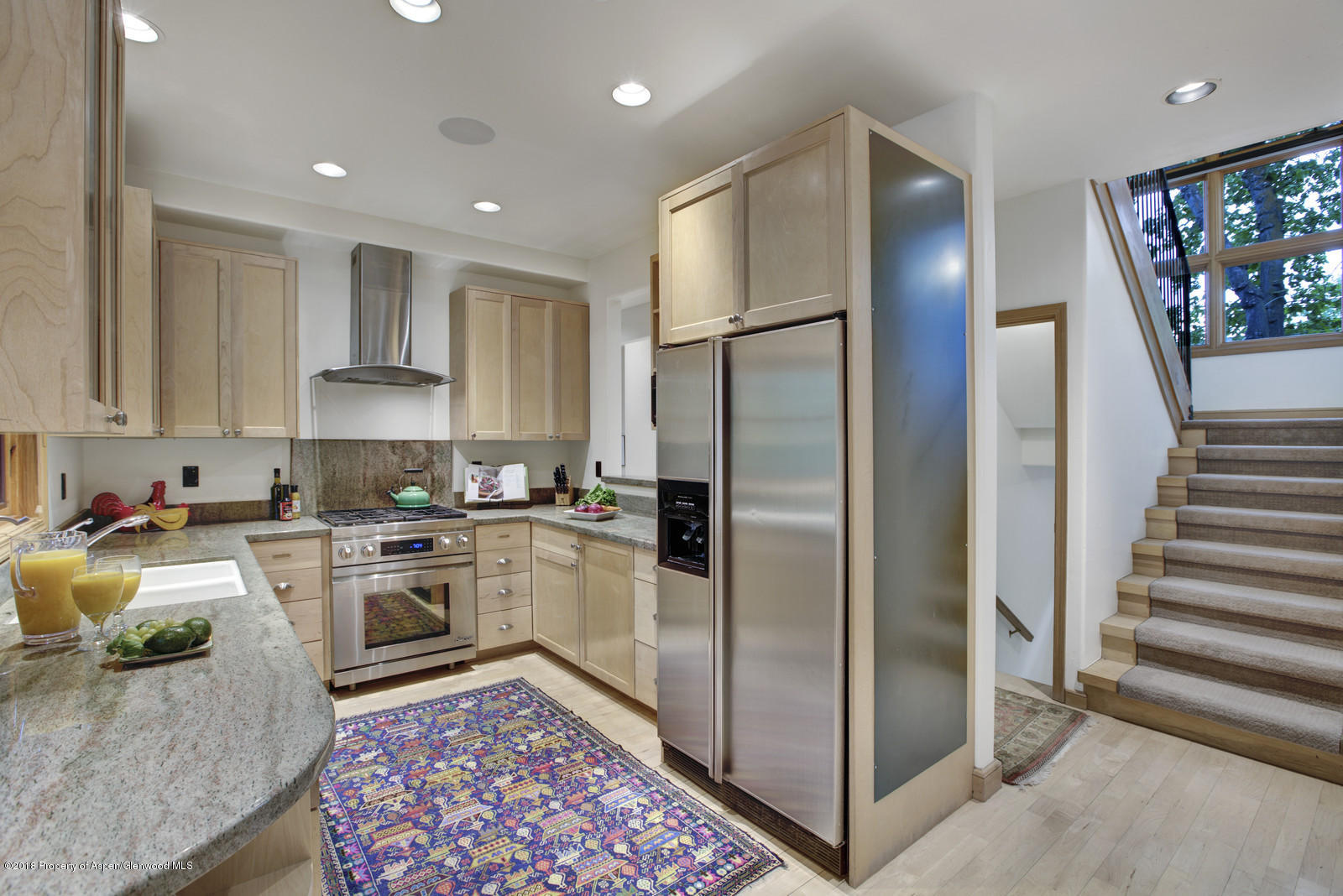 146 East Homestead Drive Basalt, CO 81621 - Photo 5 of 42 a kitchen with a refrigerator and a sink