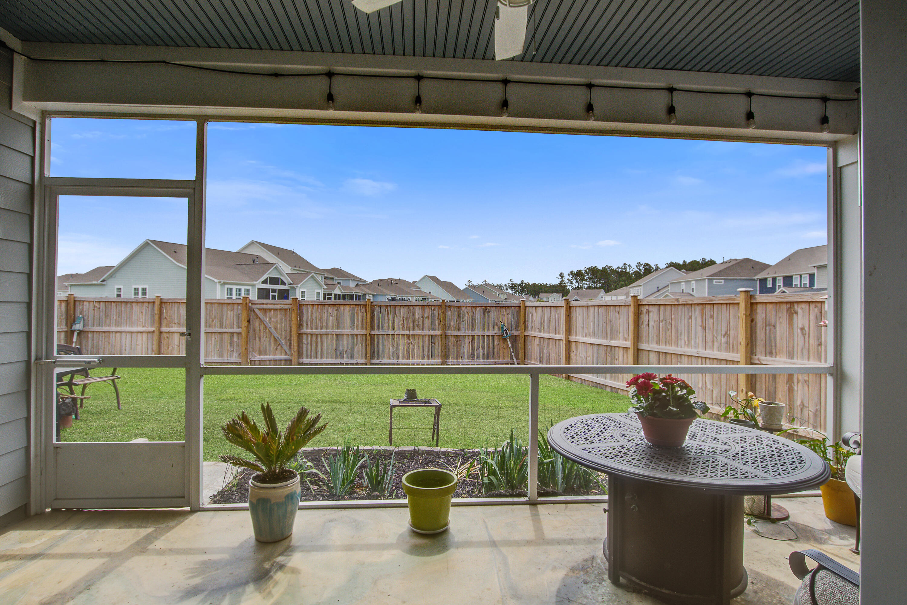 349 Long Pier Street Summerville, SC 29486 - Photo 4 of 42 Screened in Back Porch