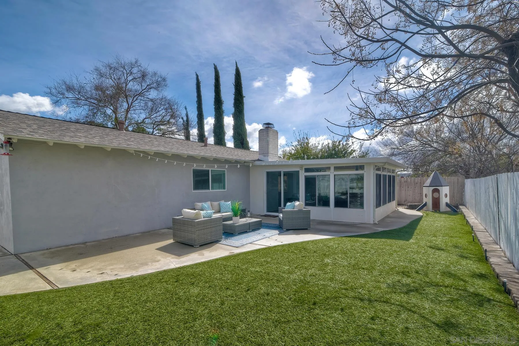 13748 Tobiasson Road Poway, CA 92064 - Photo 15 of 18 a front view of house with yard outdoor seating and barbeque oven