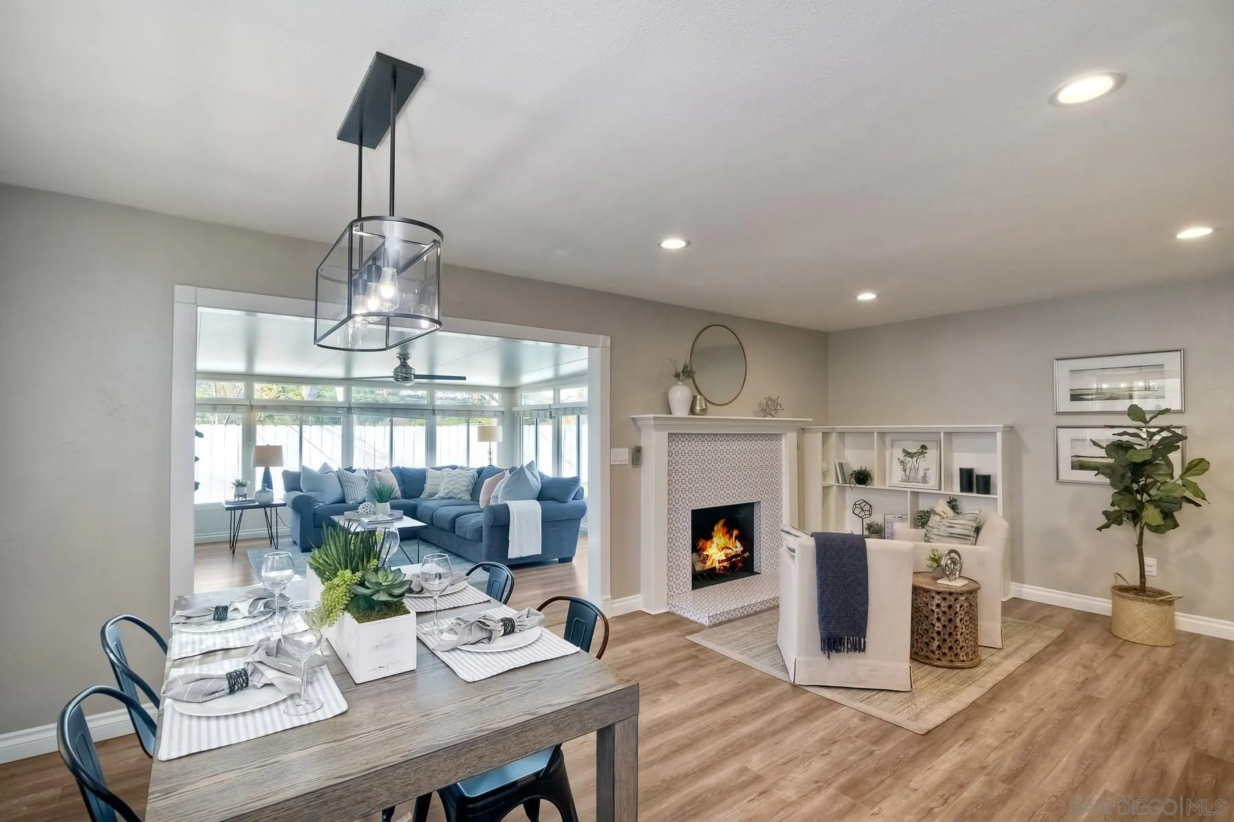 13748 Tobiasson Road Poway, CA 92064 - Photo 6 of 18 a view of a dining room with furniture wooden floor and chandelier