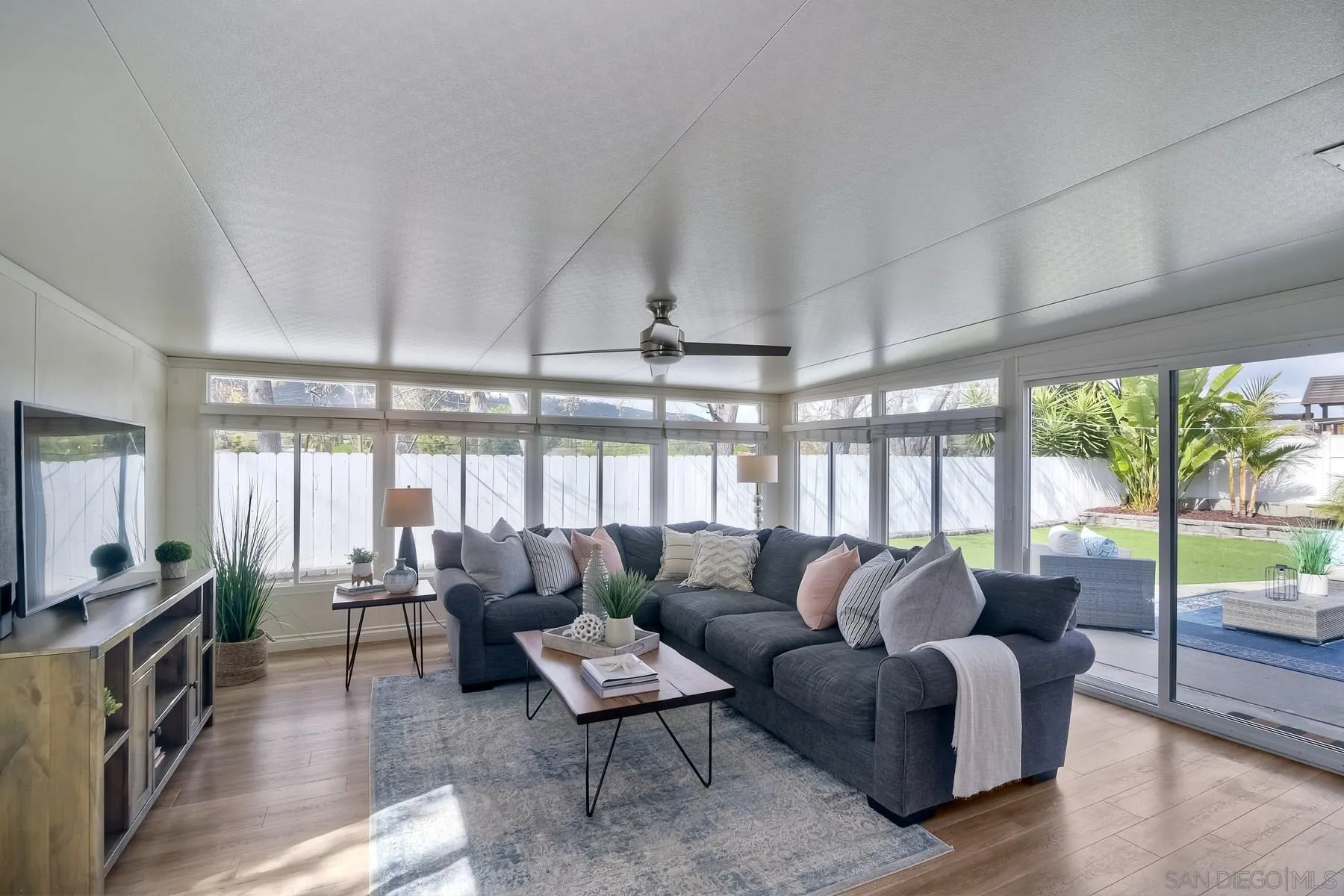 13748 Tobiasson Road Poway, CA 92064 - Photo 7 of 18 a living room with furniture and a large window
