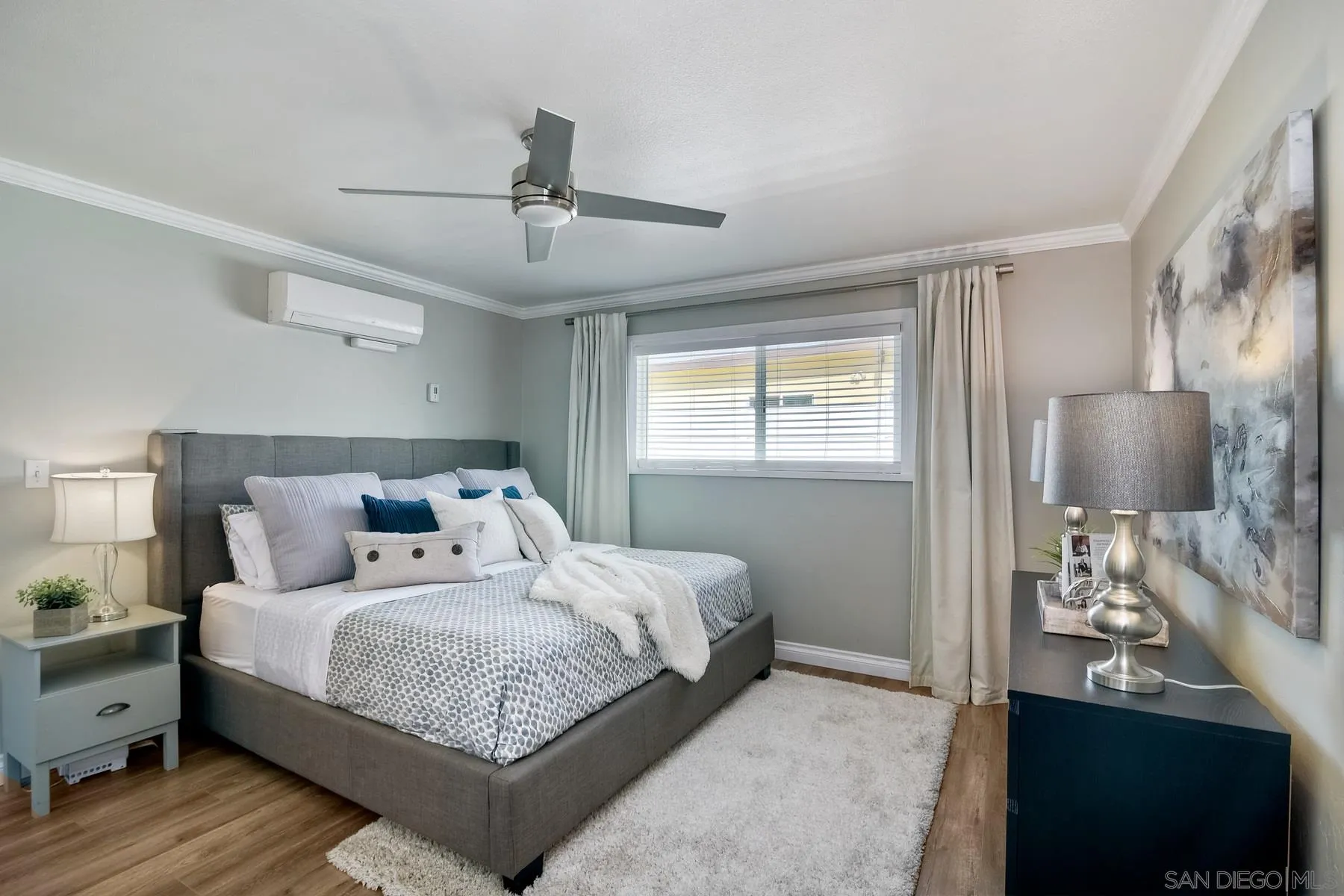 13748 Tobiasson Road Poway, CA 92064 - Photo 8 of 18 a bedroom with a bed and a night stand