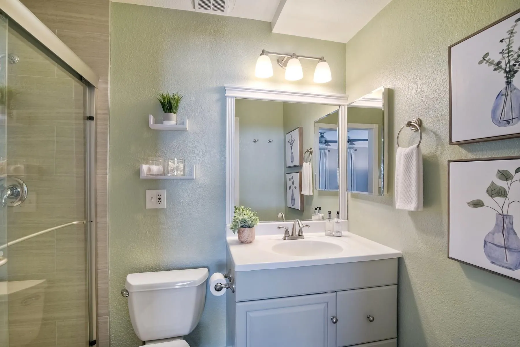 13748 Tobiasson Road Poway, CA 92064 - Photo 10 of 18 a bathroom with a toilet sink and mirror