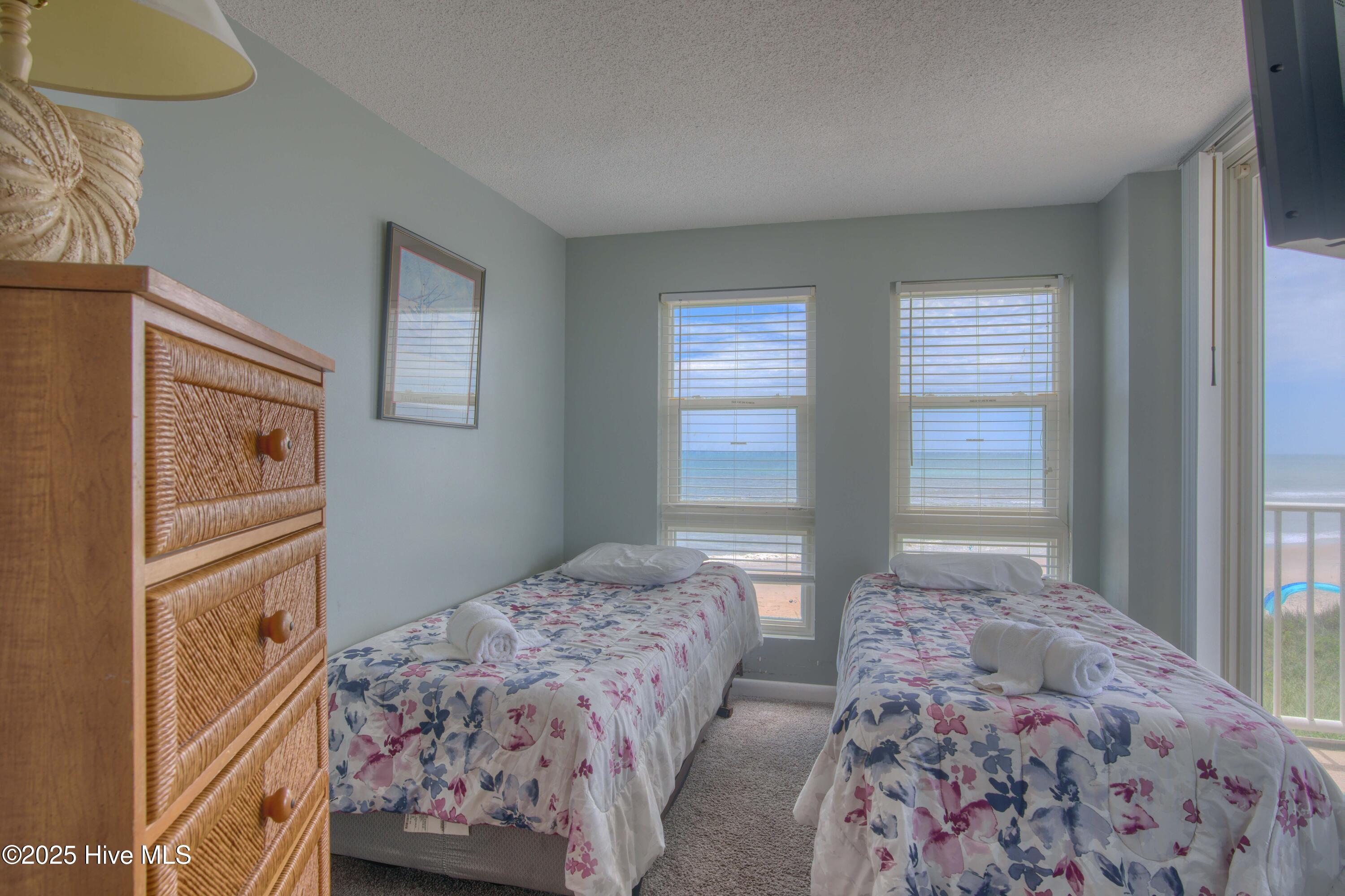 2000 New River Inlet Road, Unit 1207 North Topsail Beach, NC 28460 - Photo 14 of 30 1207 St. Regis - Living room and Bedroom