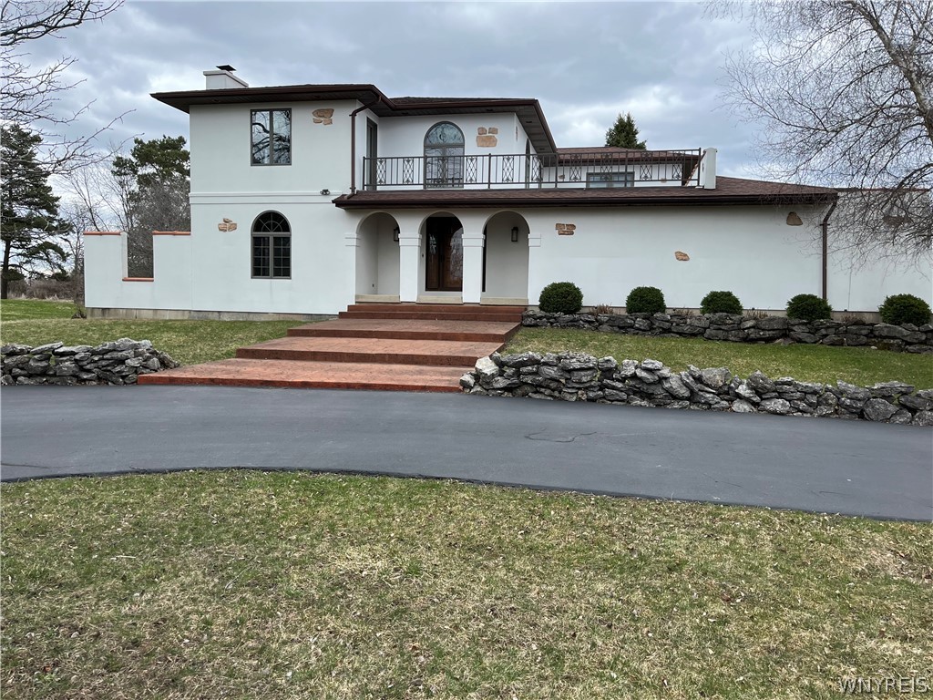 5065 Kraus Road Clarence, NY 14031 - Photo 1 of 1 Front yard with circular driveway and professional