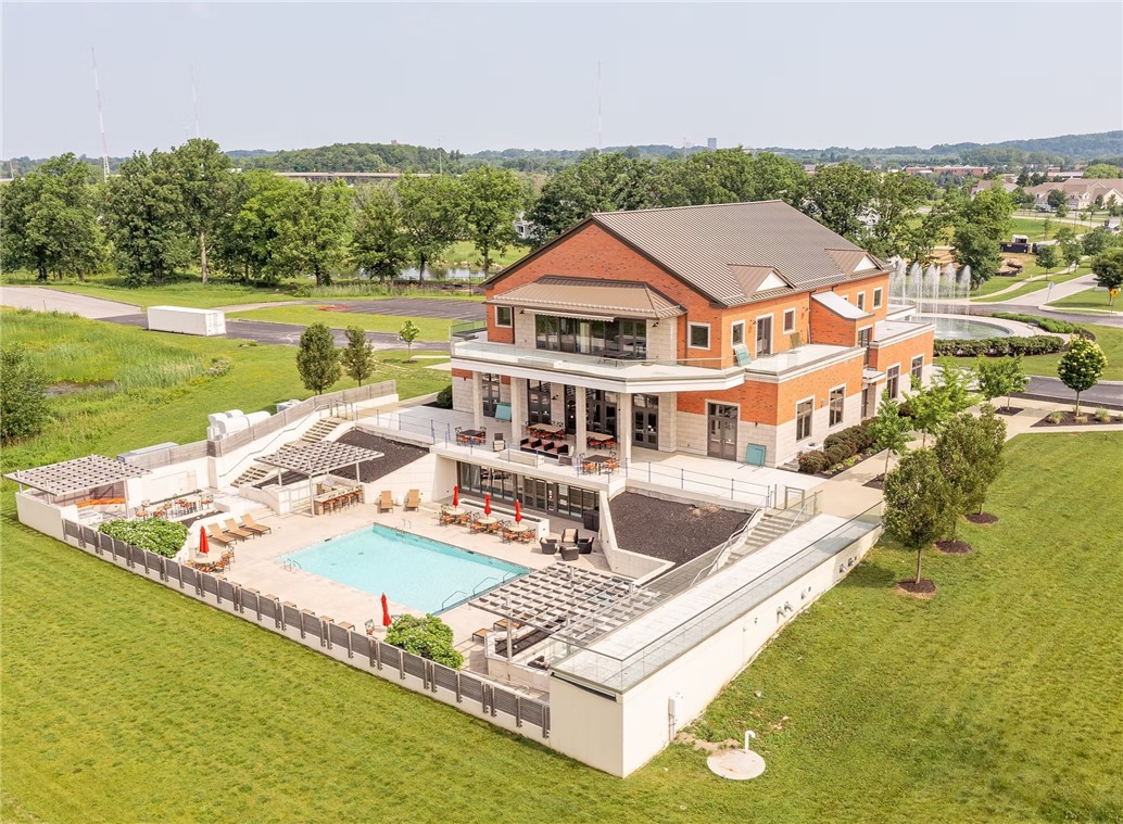 216 Bretlyn Circle Brighton, NY 14618 - Photo 22 of 48 Rear view of the Clubhouse Community center