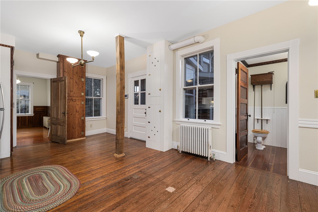 39 Walcott Avenue Jamestown, RI 02835 - Photo 17 of 46 A half bath with new washer/dryer is off the kitchen.