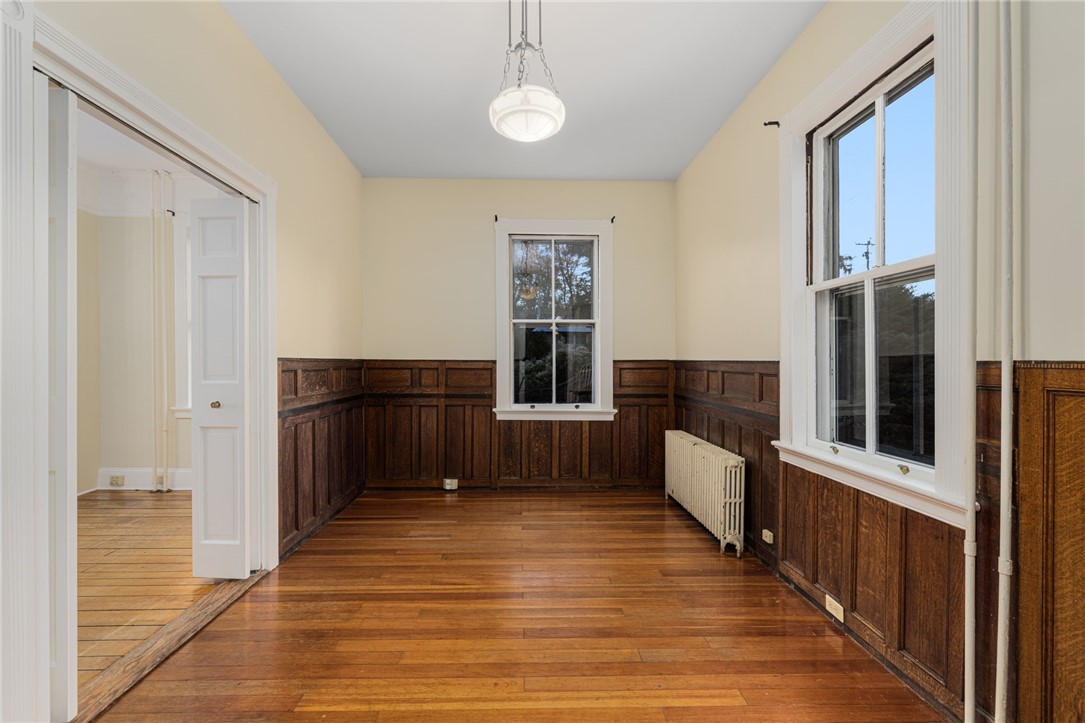 39 Walcott Avenue Jamestown, RI 02835 - Photo 21 of 46 Wood paneled study is 14'8" x 9'3".