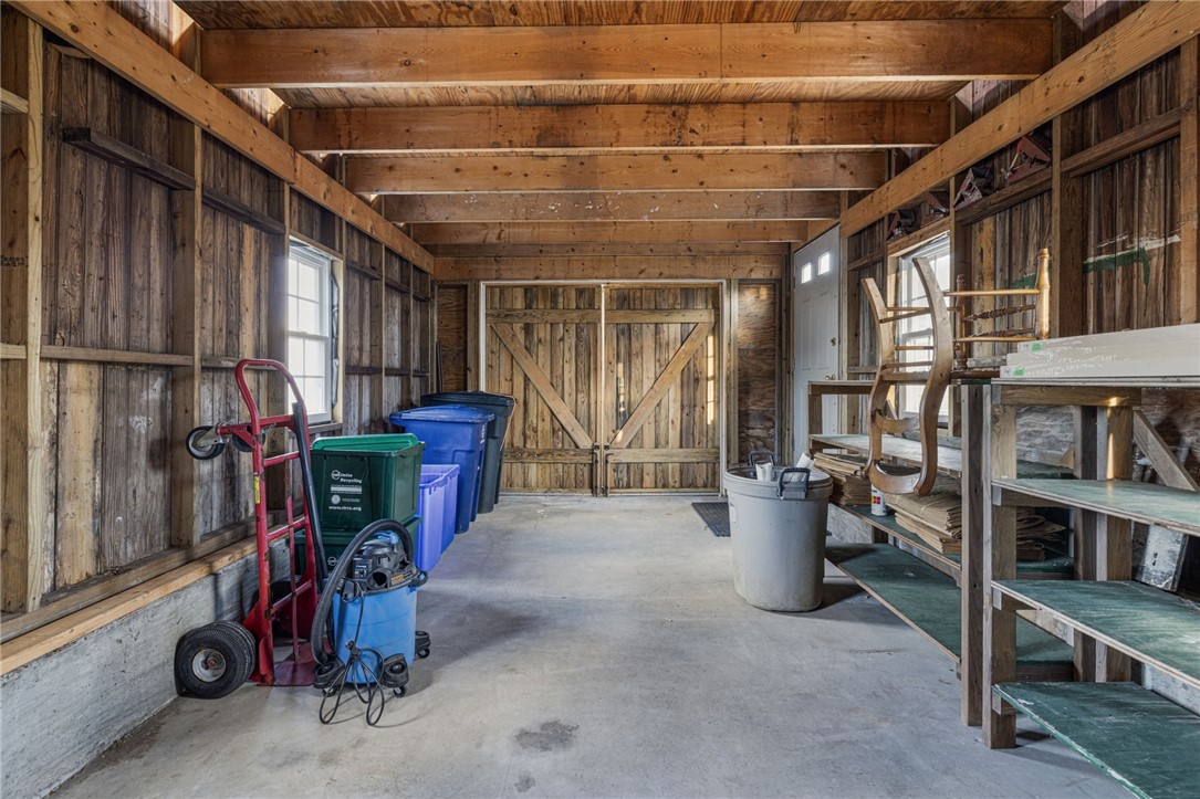 39 Walcott Avenue Jamestown, RI 02835 - Photo 33 of 46 Stairs lead to an unfinished second level.