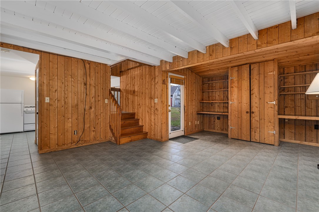 39 Walcott Avenue Jamestown, RI 02835 - Photo 40 of 46 Main level of cottage has a living room which is 19'2" x 18'10".