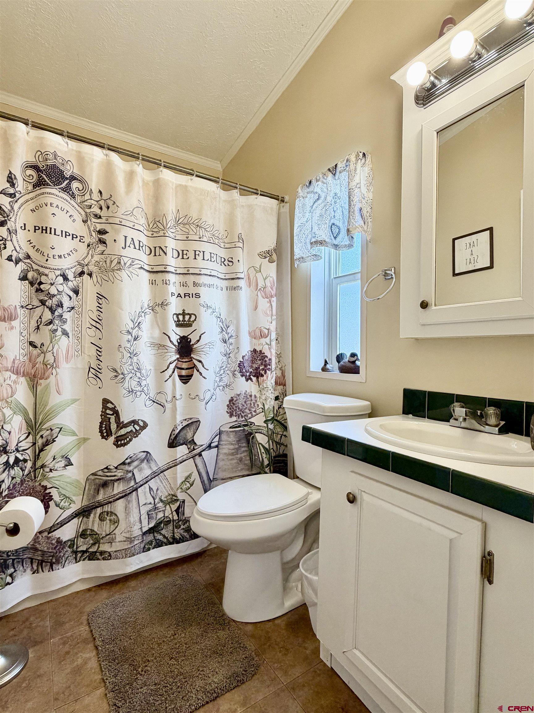 650 1725th Road Delta, CO 81416 - Photo 27 of 45 a bathroom with a sink toilet and shower