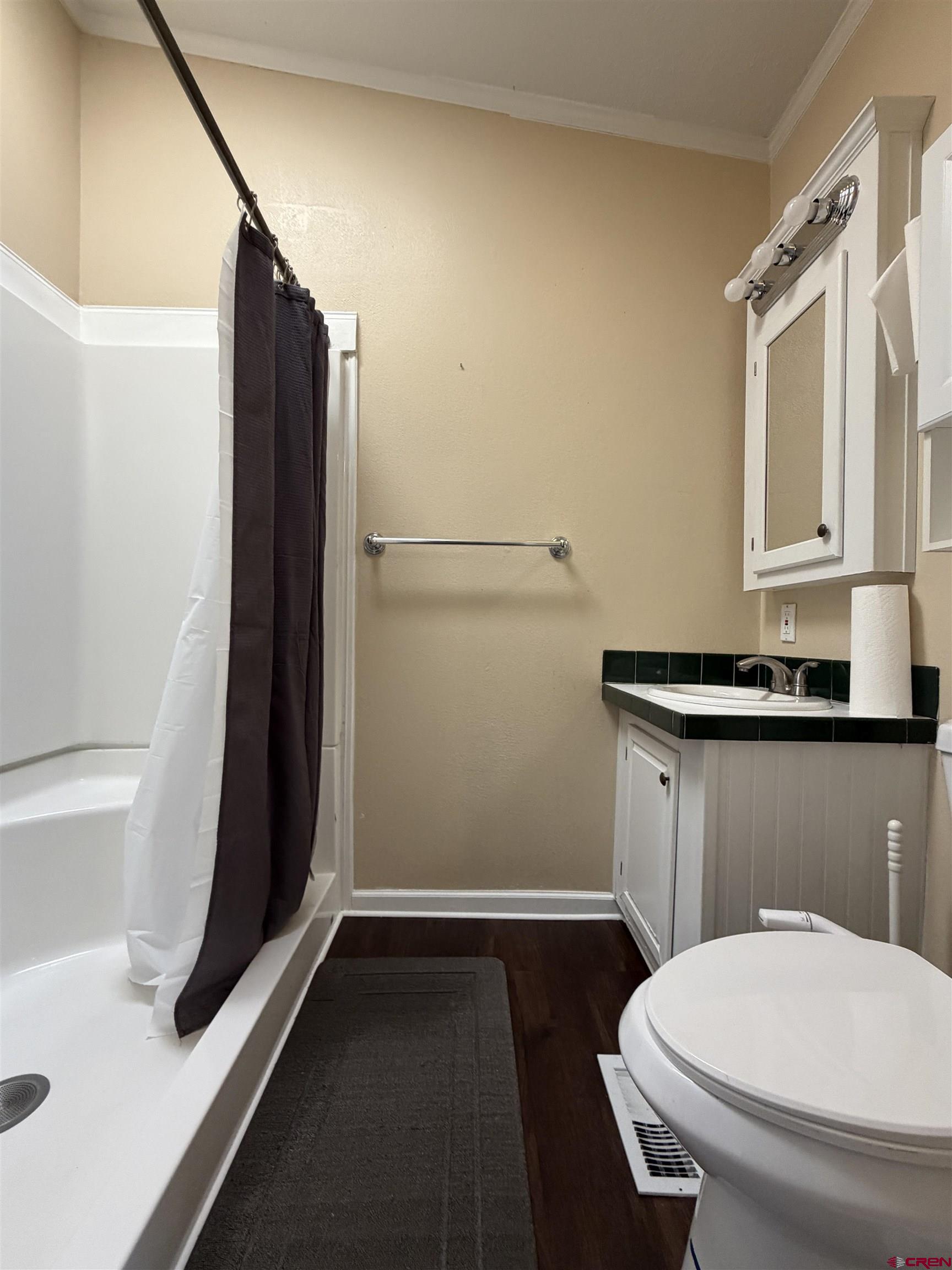 650 1725th Road Delta, CO 81416 - Photo 30 of 45 a bathroom with a sink and a mirror
