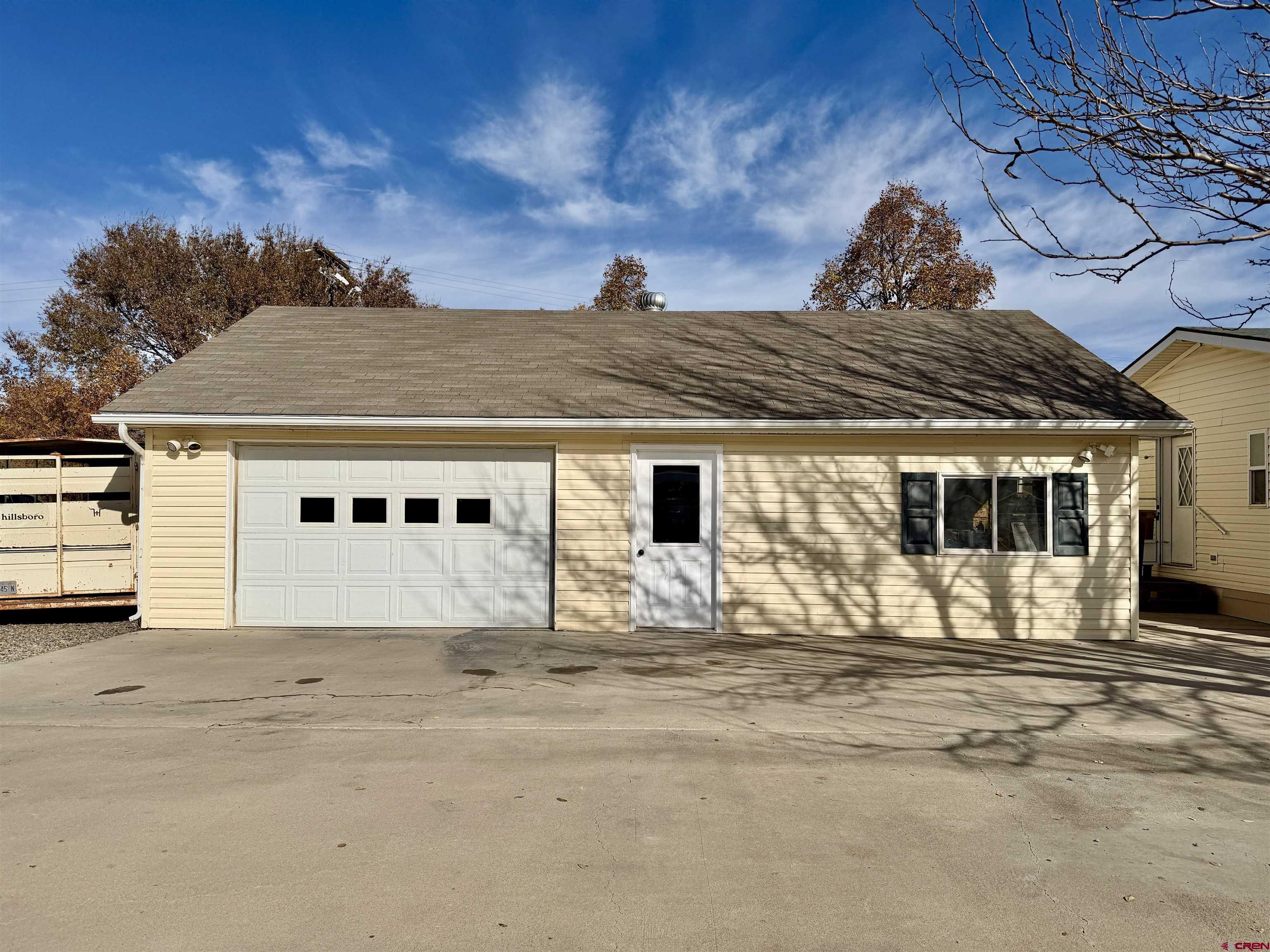 650 1725th Road Delta, CO 81416 - Photo 32 of 45 a front view of a house with a yard