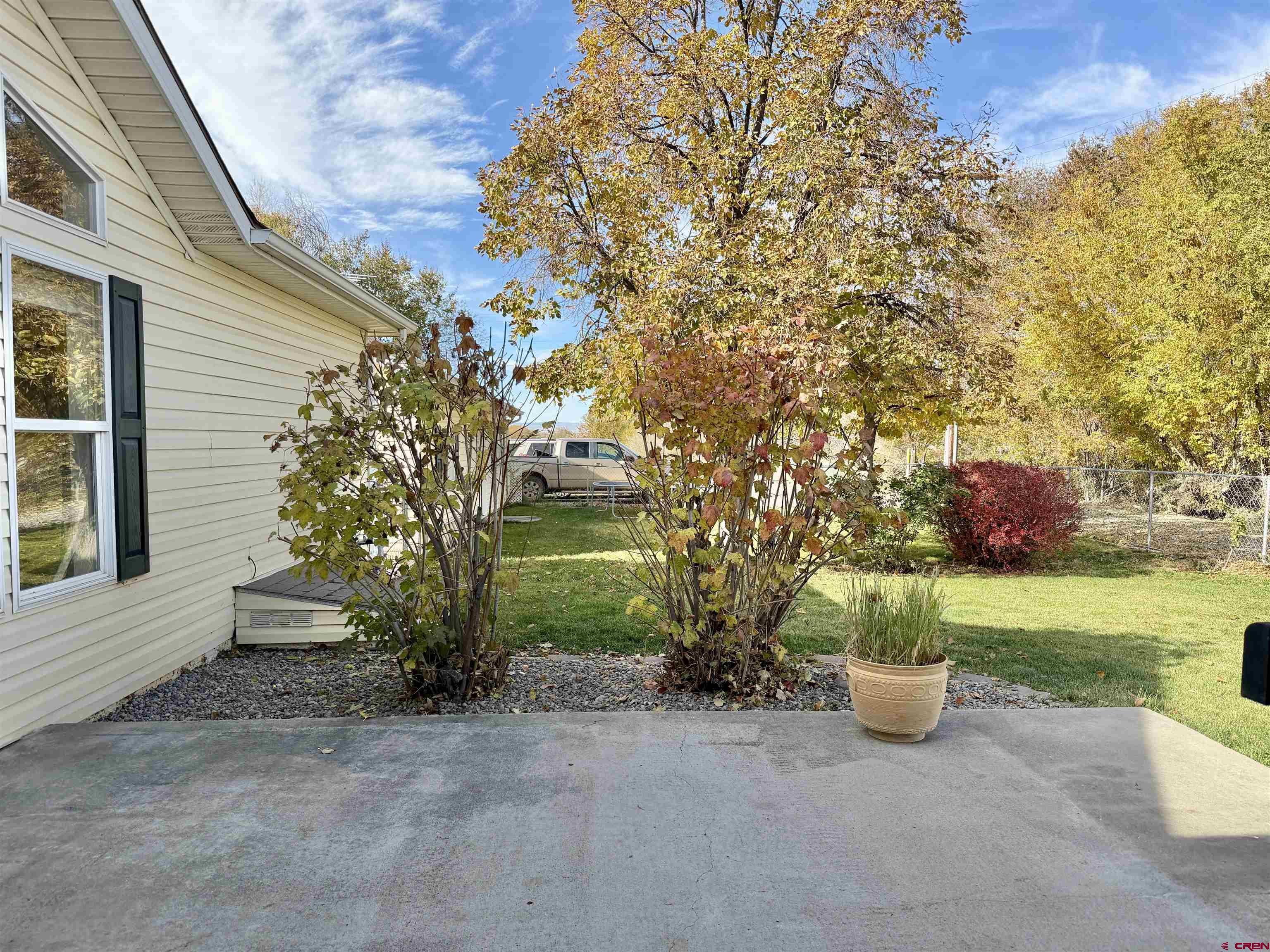 650 1725th Road Delta, CO 81416 - Photo 35 of 45 a view of a house with backyard and garden