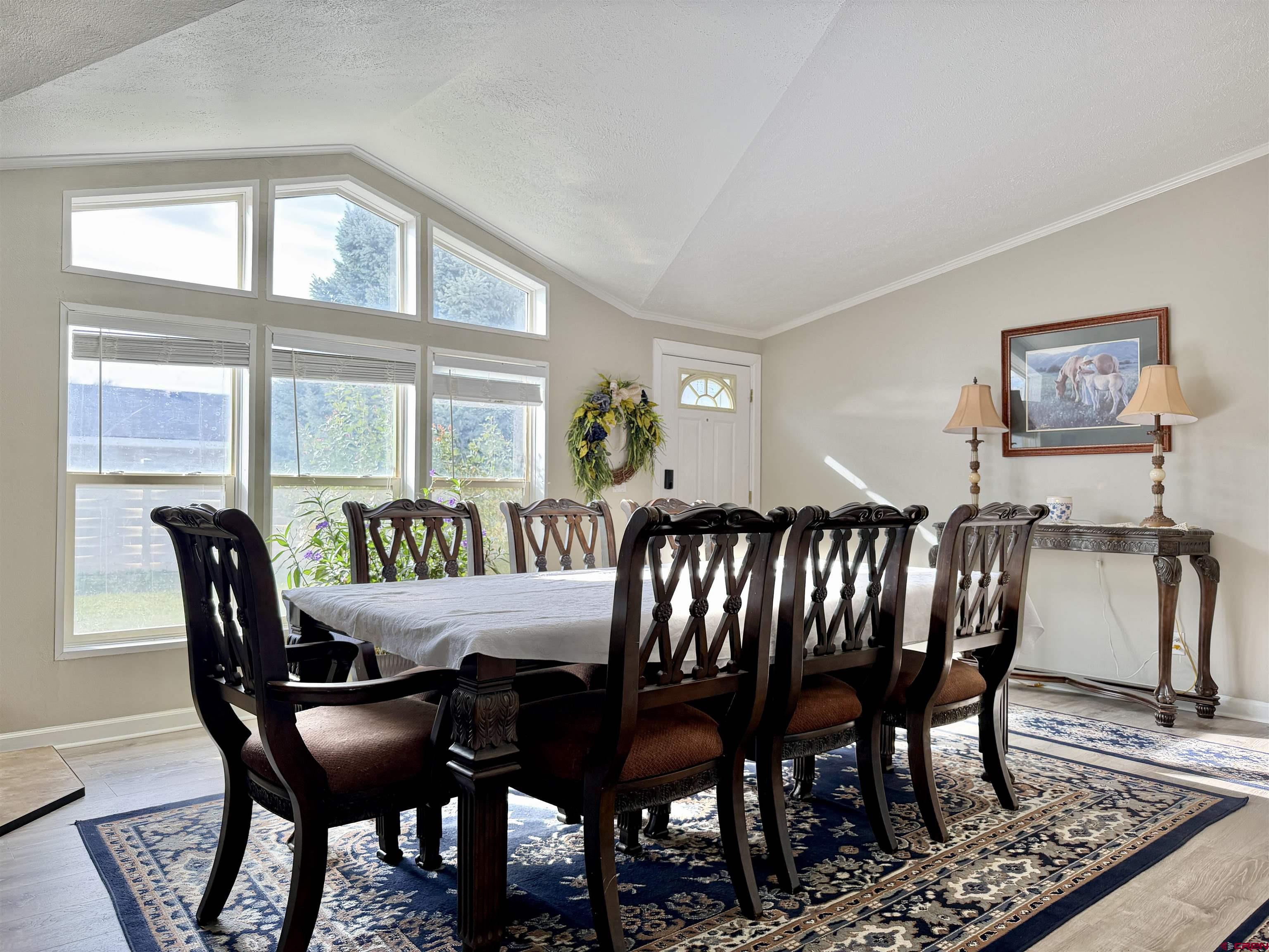 650 1725th Road Delta, CO 81416 - Photo 9 of 45 a view of a dining room with furniture and window