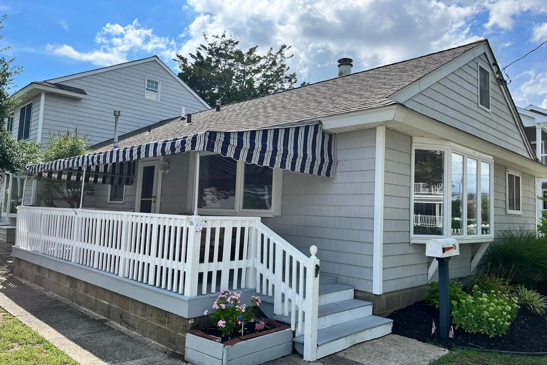 76 21st Street Avalon, NJ 08202 - Photo 2 of 18 a view of a house with a deck