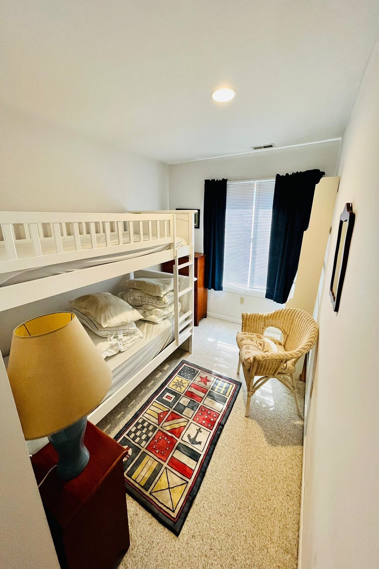 76 21st Street Avalon, NJ 08202 - Photo 6 of 18 a living room with furniture and a rug