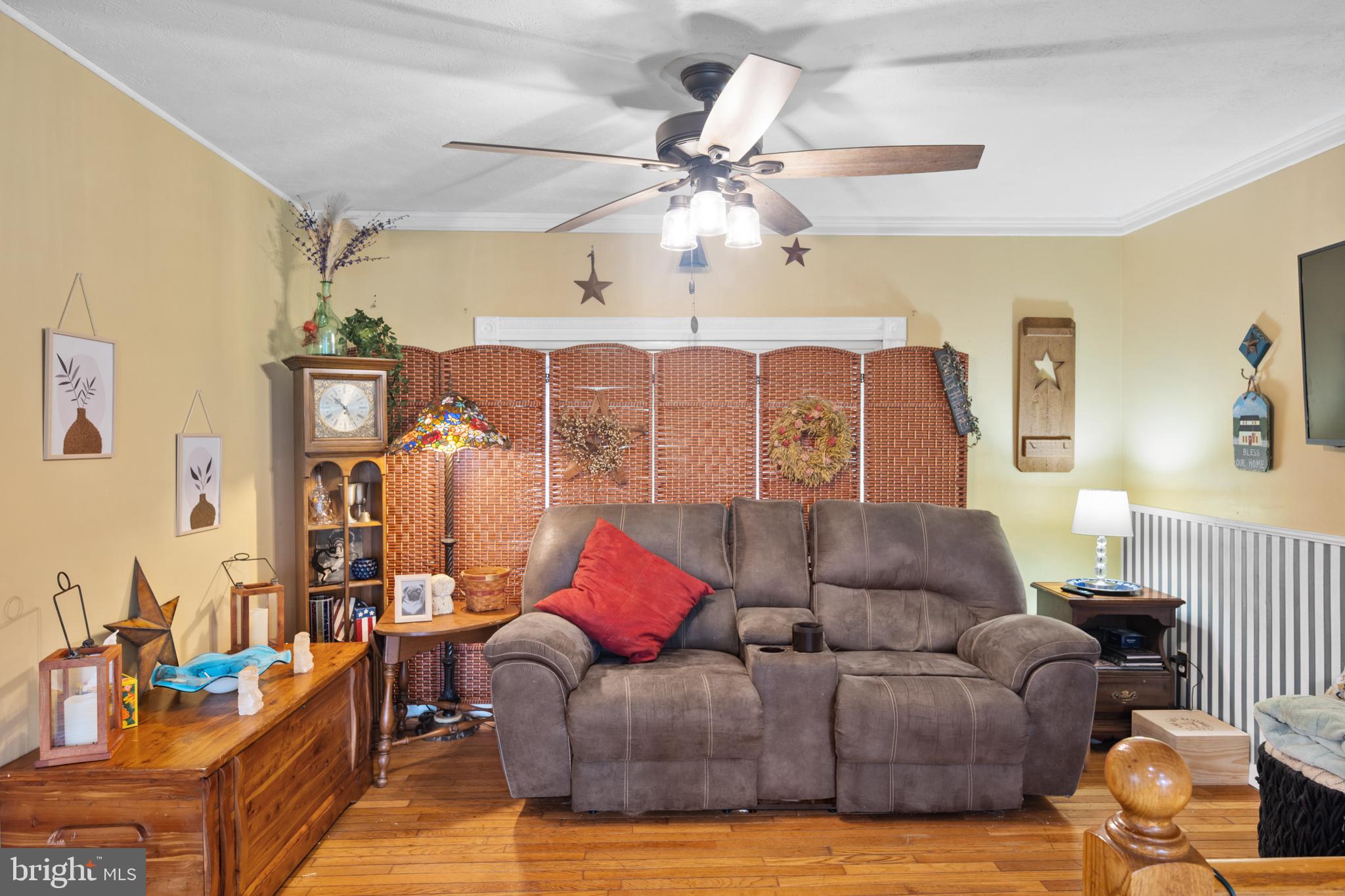1908 Conowingo Road Rising Sun, MD 21911 - Photo 16 of 99 a living room with furniture and a chandelier