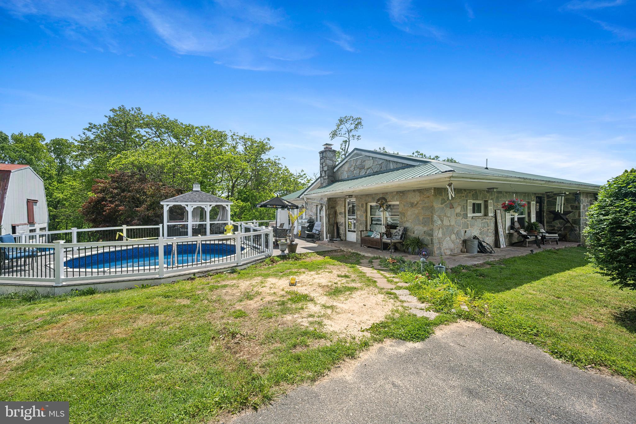 1908 Conowingo Road Rising Sun, MD 21911 - Photo 56 of 99 a view of a house with a yard patio and swimming pool
