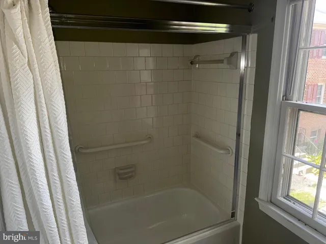a close view of a bathtub in bathroom