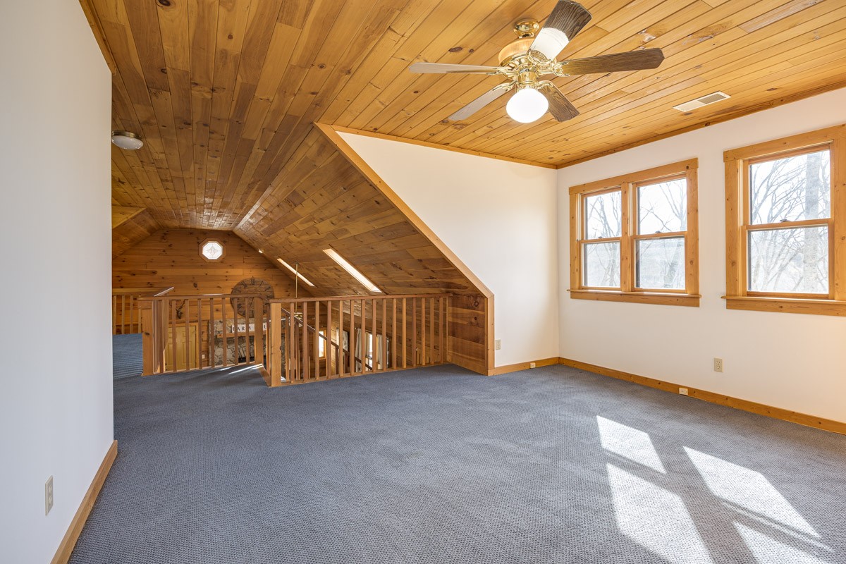 1762 Burke Hollow Road Nolensville, TN 37135 - Photo 29 of 52 en empty room with windows and ceiling fan