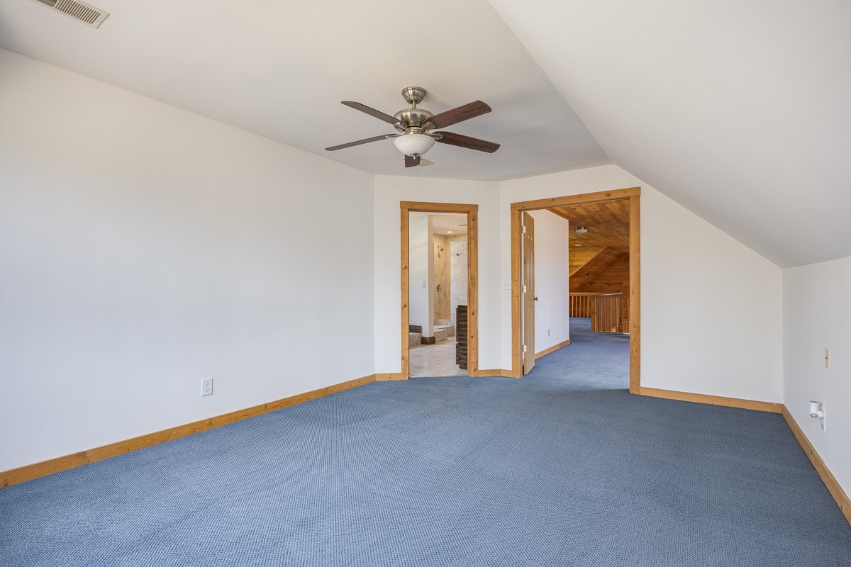 1762 Burke Hollow Road Nolensville, TN 37135 - Photo 32 of 52 an empty room with a ceiling fan and window