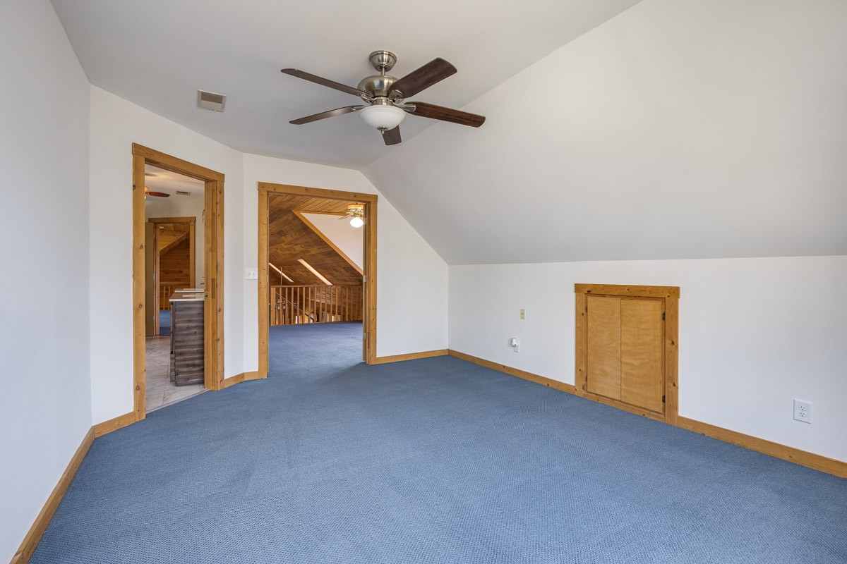 1762 Burke Hollow Road Nolensville, TN 37135 - Photo 33 of 52 a view of a livingroom with a ceiling fan and window