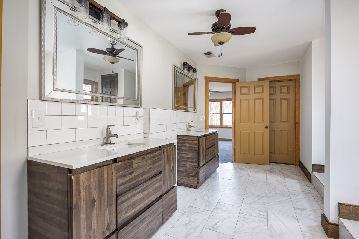1762 Burke Hollow Road Nolensville, TN 37135 - Photo 36 of 52 a bathroom with a sink vanity and mirror