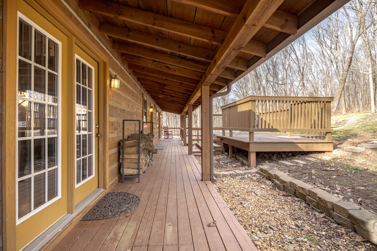 1762 Burke Hollow Road Nolensville, TN 37135 - Photo 39 of 52 a backyard of a house with wooden floor outdoor seating and barbeque