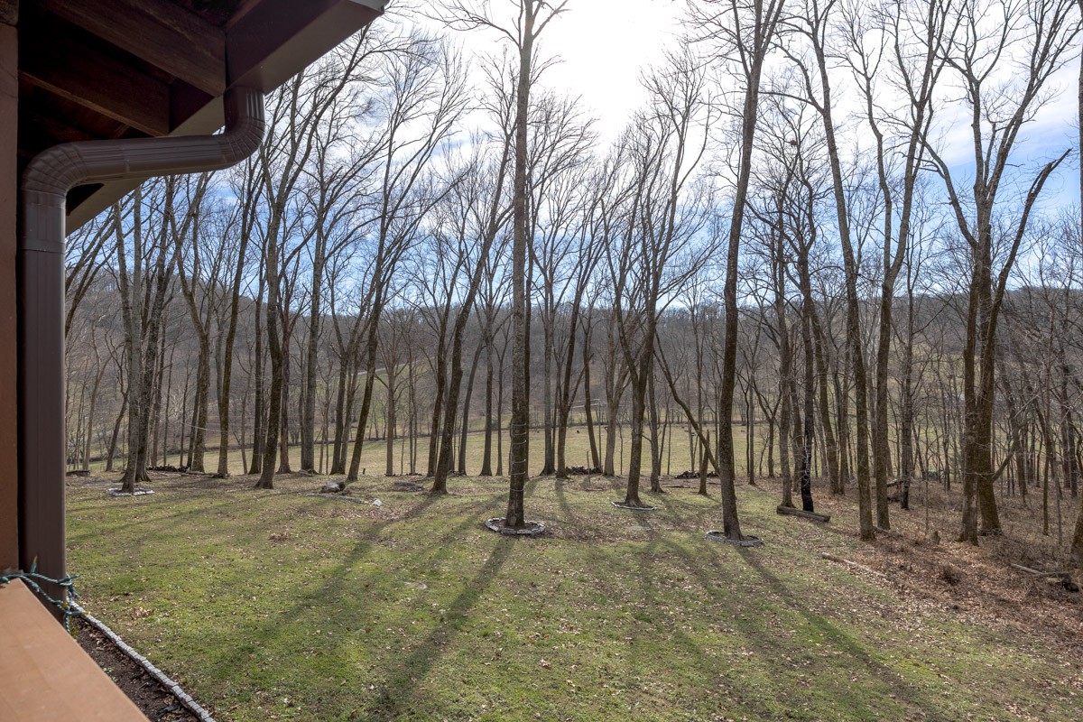 1762 Burke Hollow Road Nolensville, TN 37135 - Photo 42 of 52 a view of outdoor space with deck and trees
