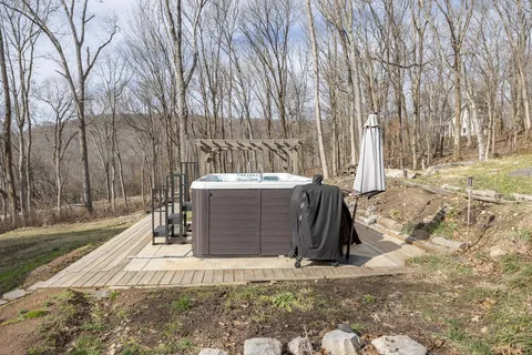 a view of yard with patio