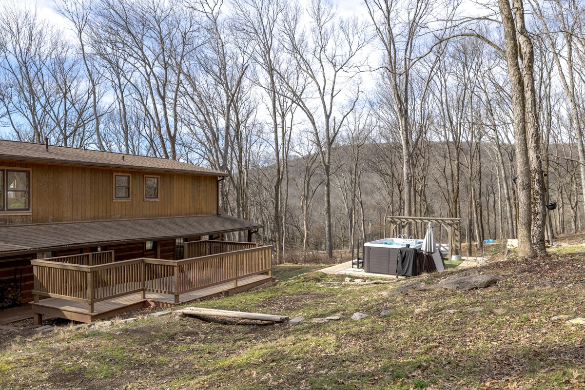 1762 Burke Hollow Road Nolensville, TN 37135 - Photo 49 of 52 a backyard of a house with barbeque oven and a stove