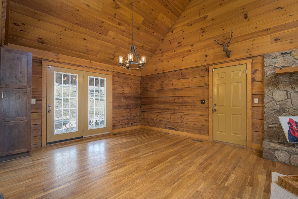 1762 Burke Hollow Road Nolensville, TN 37135 - Photo 9 of 52 a view of an empty room with wooden floor and a window
