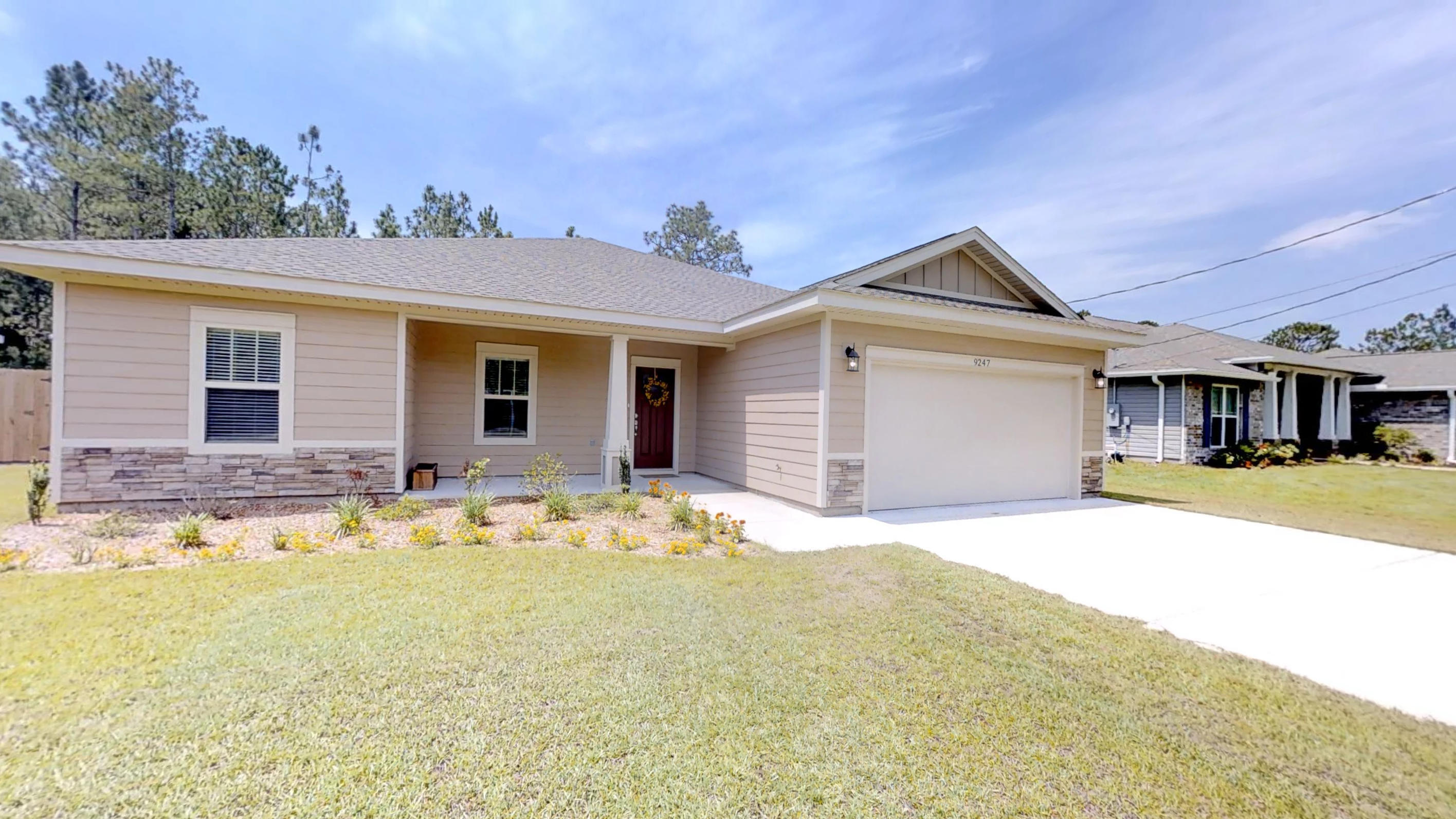 9247 Ridge Road Navarre, FL 32566 - Photo 2 of 24 Exterior Front