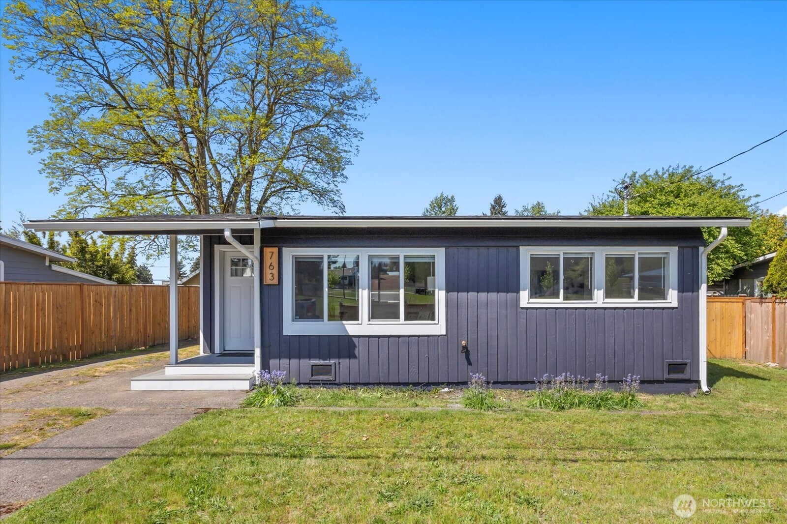 763 Edmonds Avenue Northeast Renton, WA 98056 - Photo 3 of 26 a view of a house with a yard