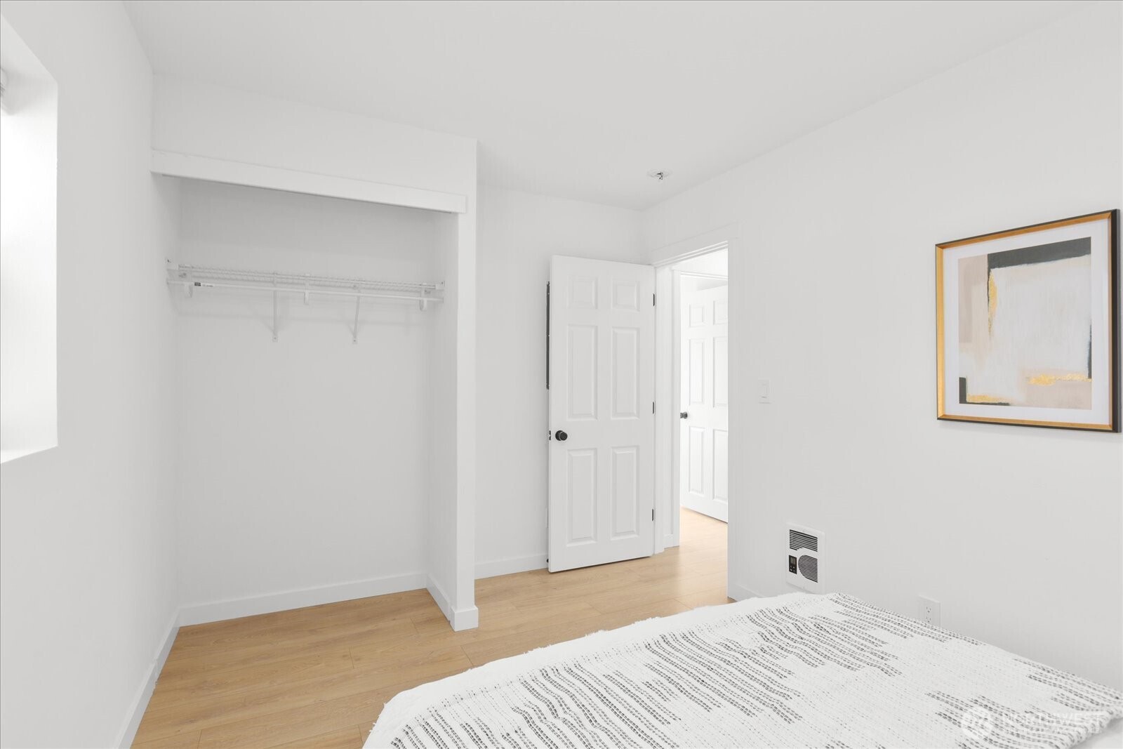 763 Edmonds Avenue Northeast Renton, WA 98056 - Photo 9 of 26 a bedroom with a bed and a window