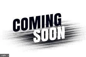 a view of a wooden fence