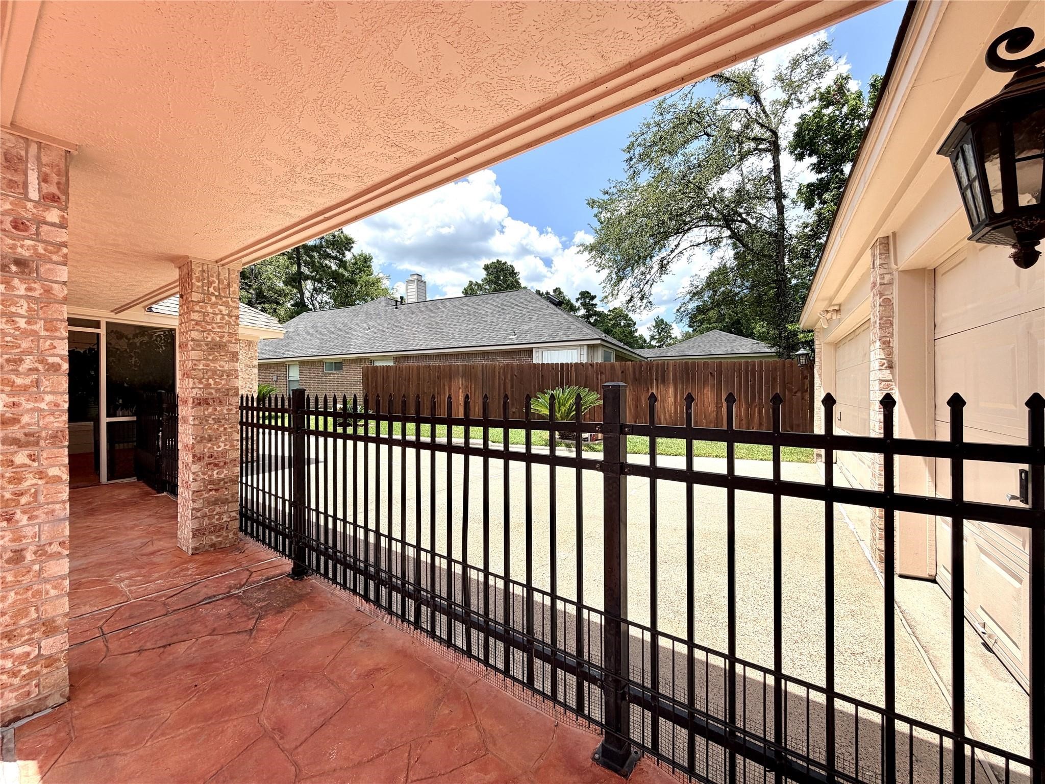24818 Haverford Road Spring, TX 77389 - Photo 43 of 45 Covered walkway between home and garage