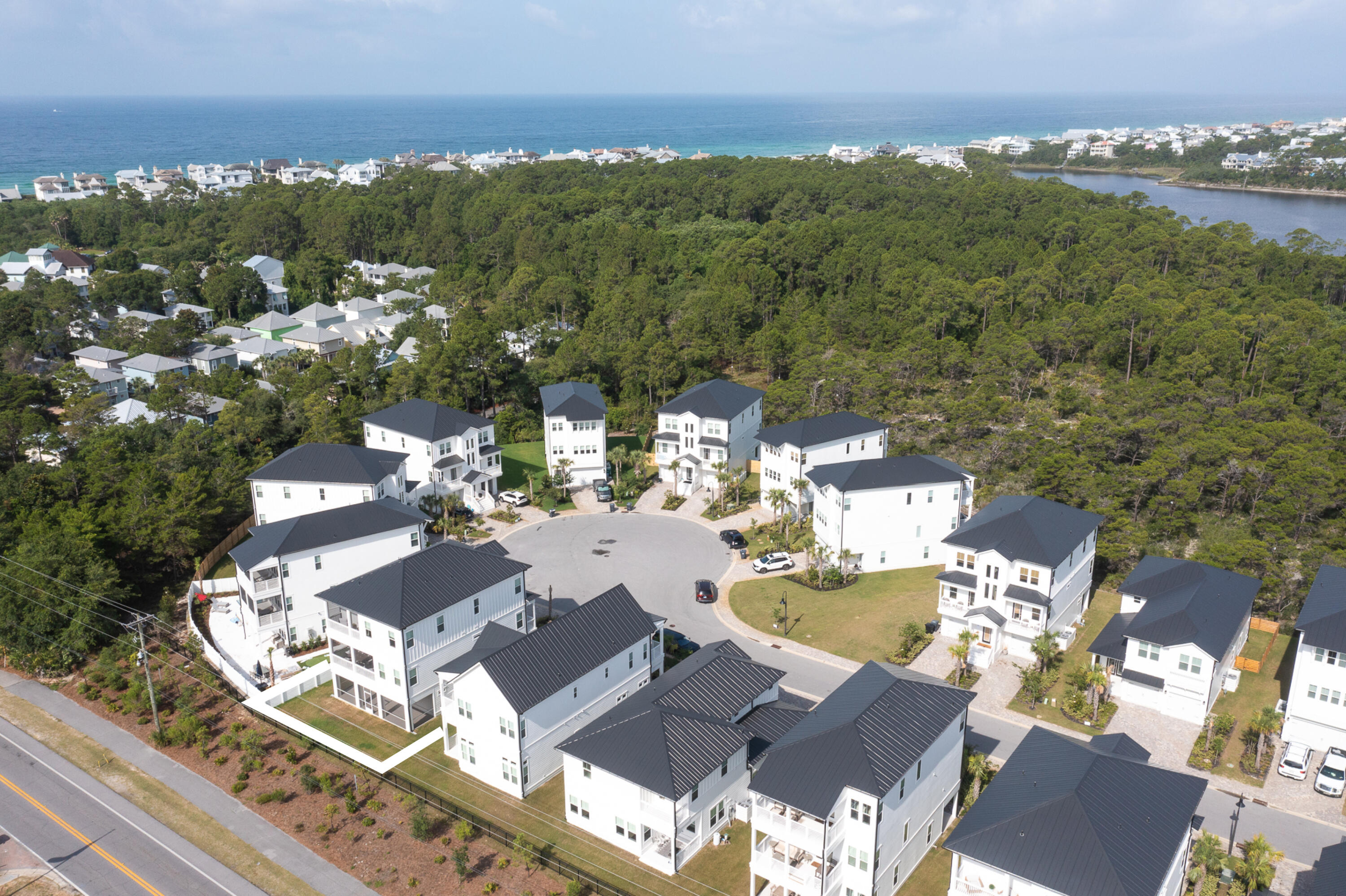 125 Seaboard Lane Santa Rosa Beach, FL 32459 - Photo 2 of 49 an aerial view of a house with a outdoor space