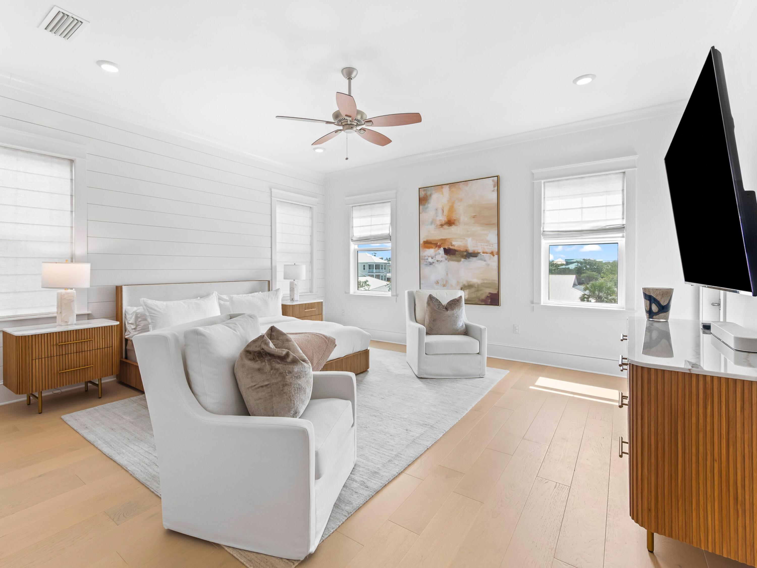 125 Seaboard Lane Santa Rosa Beach, FL 32459 - Photo 21 of 49 a living room with furniture and a flat screen tv