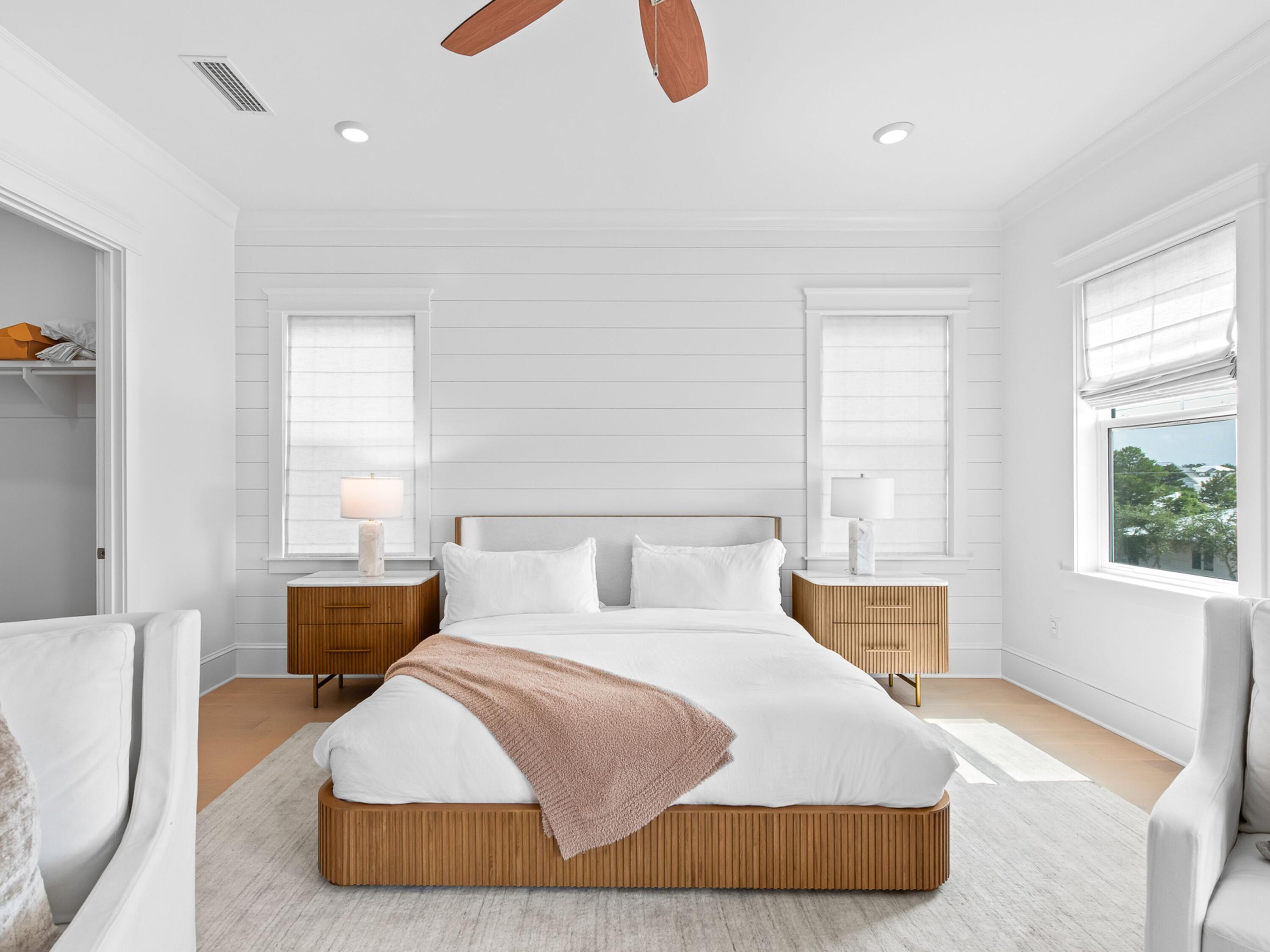 125 Seaboard Lane Santa Rosa Beach, FL 32459 - Photo 22 of 49 a bedroom with a bed and window