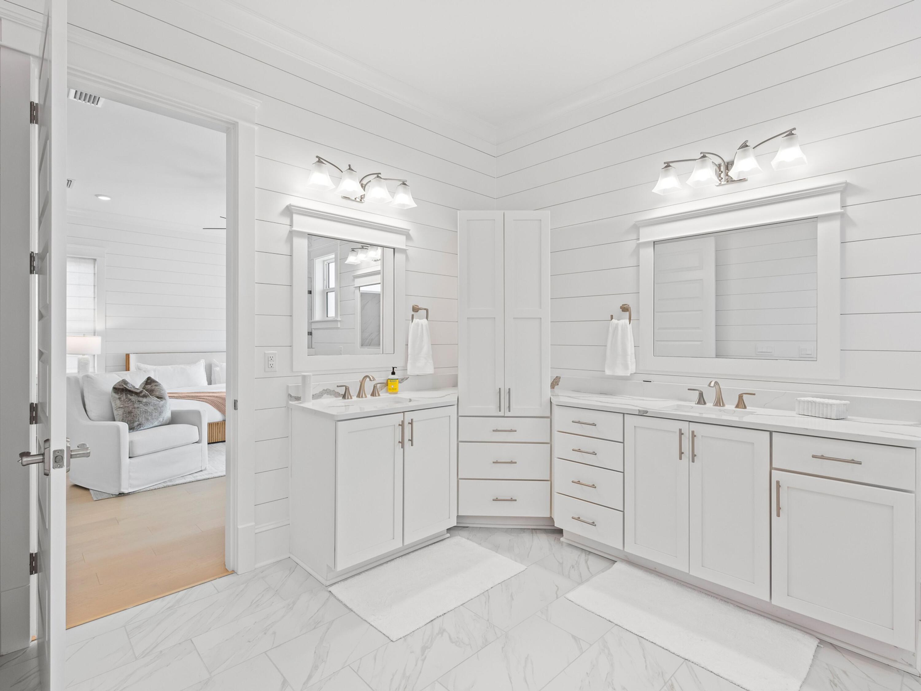 125 Seaboard Lane Santa Rosa Beach, FL 32459 - Photo 26 of 49 a spacious bathroom with double sink and a mirror