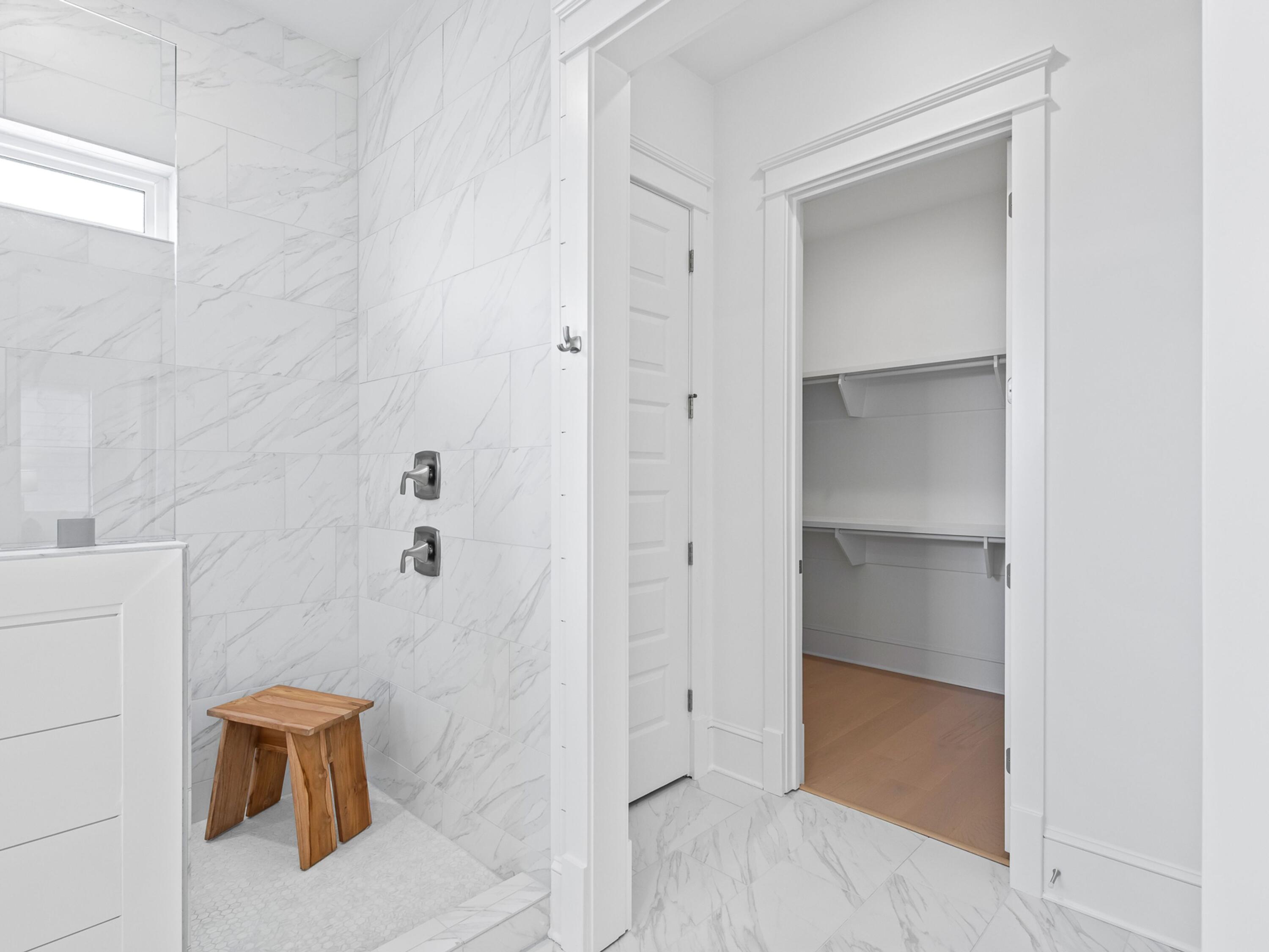 125 Seaboard Lane Santa Rosa Beach, FL 32459 - Photo 29 of 49 a bathroom with a shower